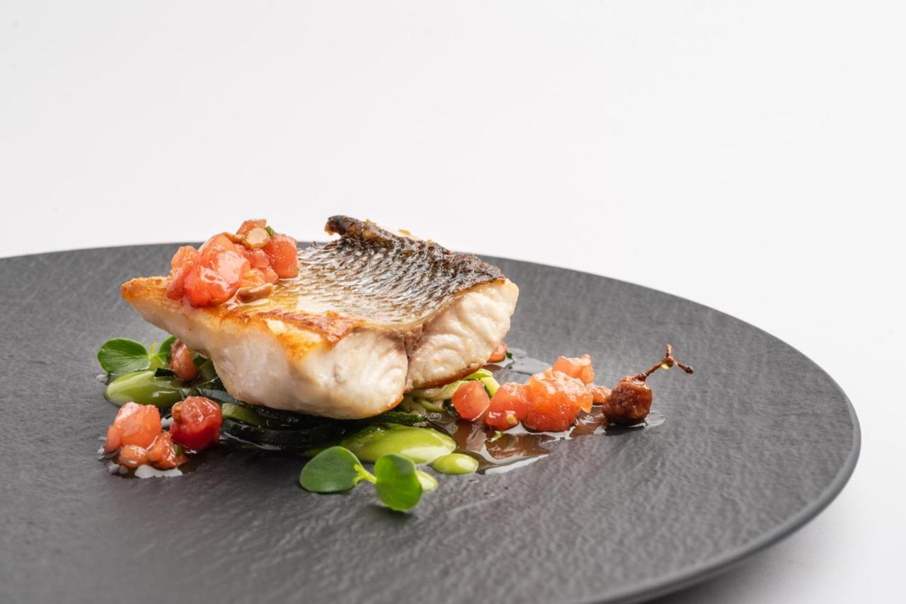 Eurostars Hotel De La Reconquista Oviedo Exterior photo A prepared fillet of grouper